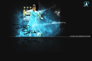 Eine Person kickt einen Fußball auf einem Feld.