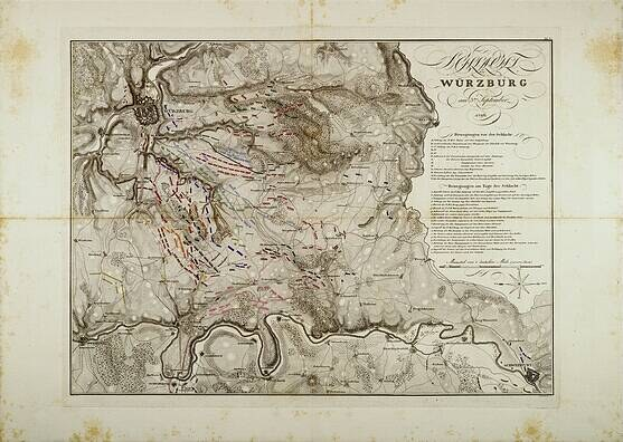 Detailierte alte Karte von Würzburg, Deutschland, die Straßen, Gebäude und Sehenswürdigkeiten zeigt, begleitet von Text über Bevölkerung, Straßen und andere Merkmale.