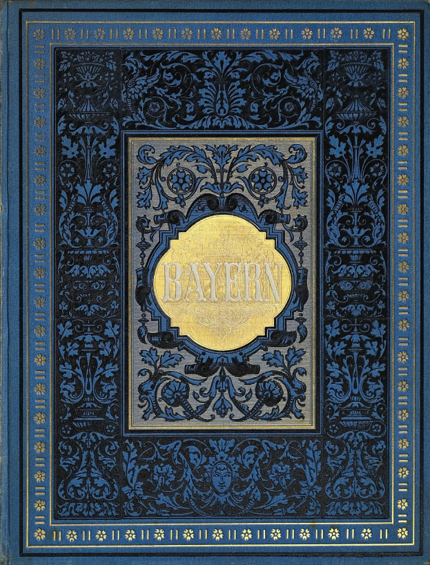 Ein blau-goldenes Buch mit dem Wort "Bayern" auf dem Cover, das mit detaillierten Dekorationen verziert ist.