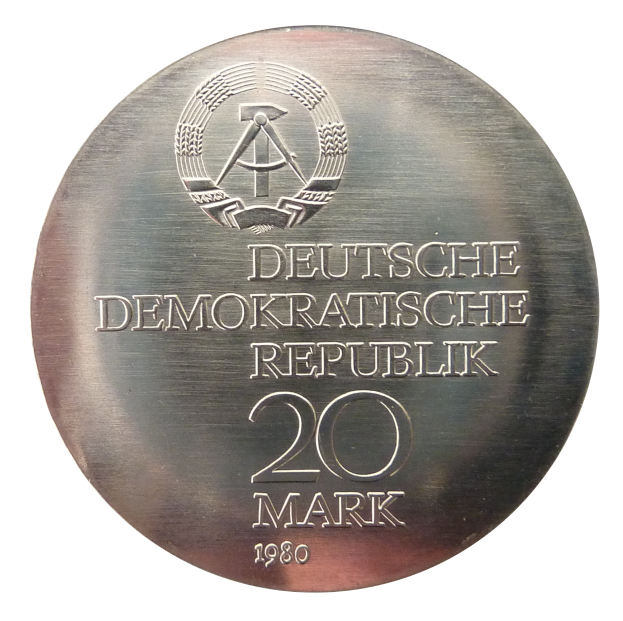 Eine Silbermedaille mit der Aufschrift "Deutsche Demokratische Republik" auf einem weißen Hintergrund.