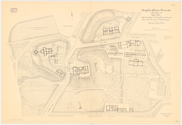 Alte gedruckte Karte von München, Deutschland, mit dichter Gebäudeplanung und handgeschriebenen Textanmerkungen auf altem Papier.